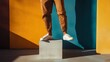 © Juan - Man standing on pedestal with modern color backdrop