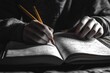 © Anjali - A person sketches in a notebook using two pencils, engrossed in creative work or study.