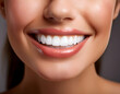© JARVIS X - Close-up of a woman's radiant smile Healthy white teeth, beautiful lips, and a perfect smile.