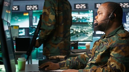 Poster - Army telecommunication systems operator using radio and satellite gear, providing combat support. Military dispatcher managing communications networks, looking at screens, camera B