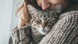 © Dara - A cat owner embracing their cat in a warm hug, feeling grateful for their companionship.