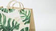 © ULFAITA - Eco-friendly gift bag with tropical leaf design