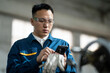 © zhu difeng - asian male engineer working in factroy