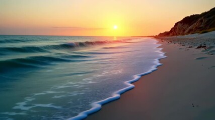 Wall Mural - Golden Hour Ocean Waves Gently Crashing on the Sandy Shore at Sunset