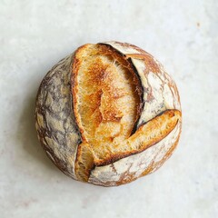 Aufkleber - Golden-Brown Crusty Sourdough Bread Loaf on Light Surface - Delicious Bakery Product Close-Up