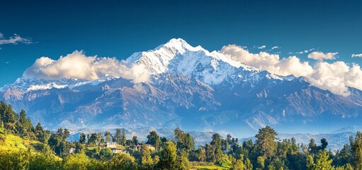 Wall Mural - beautiful view of the majestic snow-capped peak with clouds on top in the himalayas, conceptual phot