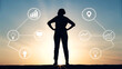 © Boontharika - Solopreneur Business Freelance Independent Silhouette of a person with icons representing data and technology against a sunset background.