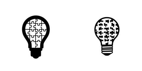 Poster - creative black icons depicting light bulbs designed with puzzle pieces and intricate patterns for in
