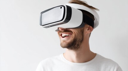 Fototapete - Happy Man Enjoying Virtual Reality Experience With VR Goggles on a Flat White Background