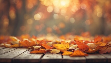 Poster - Autumn leaves on a wooden table with a natural background