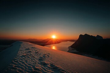Poster - Sunrise over sandy dunes and mountains in a tranquil landscape by the water