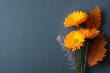 Aufkleber - Bright orange flowers and autumn leaves arranged artistically against a blue background showcasing seasonal colors