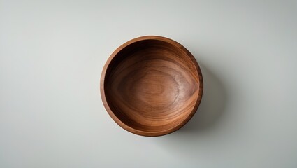 Poster - Overhead perspective of a wooden bowl isolated on a background with clipping path