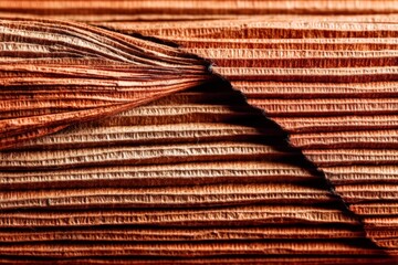 Leinwandbilder - Close-up view of textured fabric showcasing folded layers and rich color variations highlighting craftsmanship and material quality