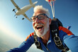 © Aisylu - Happy Skydiver senior man, smiling in free fall on flying airplane background. AI