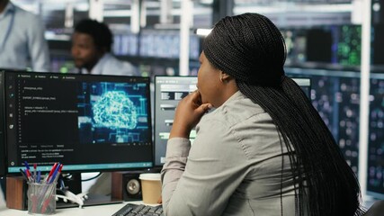 Poster - data center staff member in office using ai deep learning algorithms to analyze datasets. african am