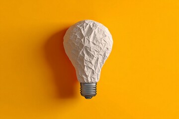 Aufkleber - Creative lamp design featuring a crumpled paper bulb on a bright yellow background