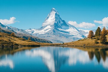Poster - Majestic Matterhorn mountain reflects in serene lake under clear blue sky during daytime