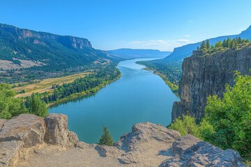 Poster - Serene view of a winding river surrounded by cliffs and lush greenery under a clear blue sky