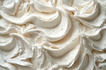 Poster - Whipped cream texture with decorative swirls in a close-up shot highlighting its smoothness and richness