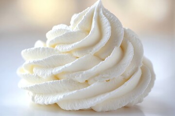 Poster - Whipped cream swirl on a smooth surface illuminated by soft lighting