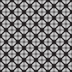 Poster - Geometric Diamonds A stark pattern of interlocking white designs on a black canvas