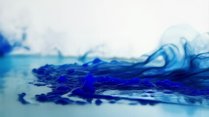Wall Mural - abstract blue ink in water swirling and mixing