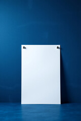 Aufkleber - White paper sheet on blue wall. Clean empty paper message. Blank template attached to the textured background. Minimalist scene. Copy space for simple design or text.