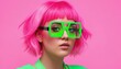 © Chainarong - Vibrant Pink Hair and Neon Green Glasses A Bold Fashion Statement