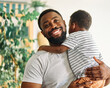 © Lumos sp - child family portrait father happy son man boy black american african smiling happiness love together parent cute hug kid little