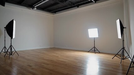 Poster - Minimalist Studio Setup with Simple Lighting in an Empty Space