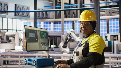 Poster - portrait of smiling technician in industrial plant overseeing solar energy installation process. hap