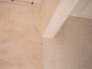 Poster - A wall with a white base and a tan top