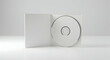 © Karmiyem - Blank CD in Jewel Case Mockup White Background Data Storage Music Software Distribution Media Technology Template