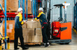 © SpaceOak - Warehouse Workers Loading Forklift.