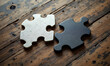 © Giggles - Two puzzle pieces lying apart on wooden table, puzzle pieces symbolizing disconnection, puzzle pieces representing emotional separation, flat lay concept