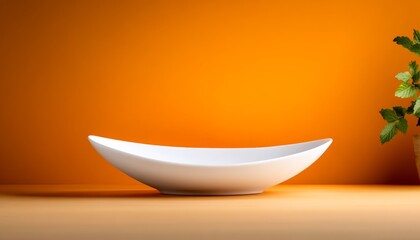 Poster - White bowl sits on a table in front of a wall with a green plant. The bowl is empty and the plant is small. The scene is simple and minimalistic, with a focus on the white bowl and the plant