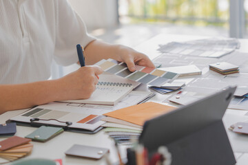 Fototapete - Architects designer working with color palette chart