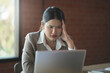 © mojo_cp - business woman sad and worry working on laptop .