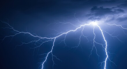 Poster - A dramatic display of lightning strikes across a dark blue sky during a powerful thunderstorm event