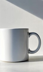 Aufkleber - White mug with gray handle rotating on a white table under sunlight creates a minimalist and stylish template for showcasing designs or branding