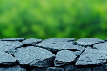 Aufkleber - Stone surface exhibiting rough texture in front of blurred green jungle backdrop