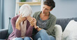 © peopleimages.com - Support, sofa and woman with senior mother for grief, loss or emotions with care and empathy. Comfort, hug and female person helping elderly mom with sadness, memory or alzheimers in retirement home.