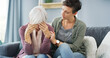 © peopleimages.com - Comfort, sofa and woman with senior mother for grief, loss or emotions with care and empathy. Support, hug and female person helping elderly mom with sadness, memory or alzheimers in retirement home.