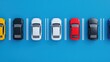 © Nice Seven - Aerial View of Multiple Modern Vehicles Parked in Neat Lines on Bright Blue Surface at a Charging Station for Electric Cars and Sustainable Transport