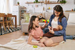 © Bliss - Celebrating love and motherhood during a cozy family moment on Mothers Day at home