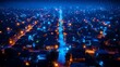 © Helois - Aerial view of a residential neighborhood at night, illuminated by various street lights and home lights