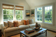 © MDBodrul - A cozy and stylish living room with a warm design featuring a neutral sofa, coffee table, and natural light streaming through large windows