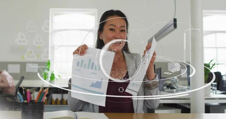 Poster - Office professional woman presenting finance charts at desk, showing animated circular data overlay