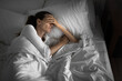 © kieferpix - sad depressed tired woman home alone in her bed getting bad sleep